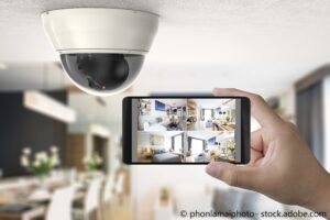 hand holding 3d rendering mobile connect with security camera